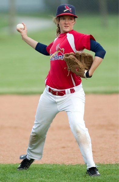 Peewee AAA St. Albert Cardinals&#8217; shortstop Julia Nicholson fires a ball towards first base during the team&#8217;s 4-2 win over the Edmonton Cardinals Tuesday at Legion 