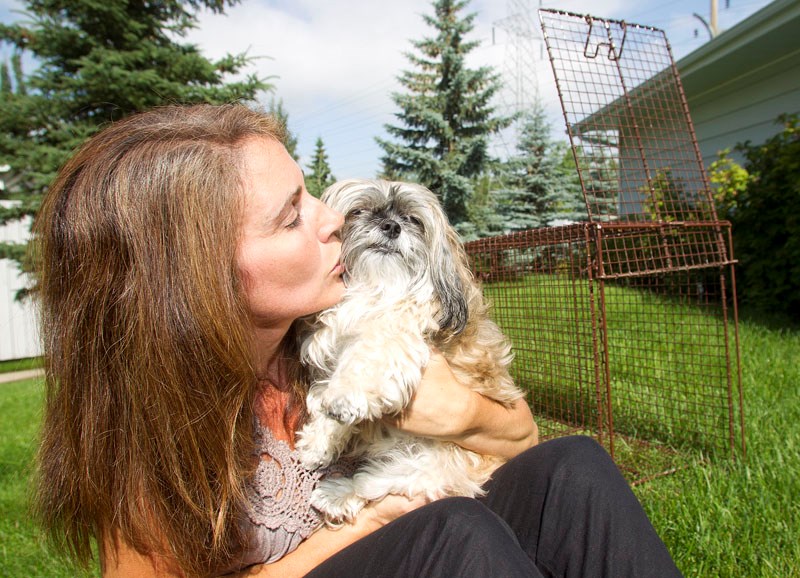 Julie Block gives her dog Shena