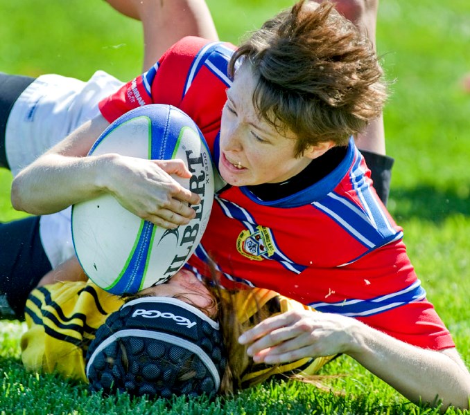 Jen Newman of the St. Albert second division women&#8217;s team dives into the try area during the second half of their game against the Grande Prairie Sirens Saturday at the 