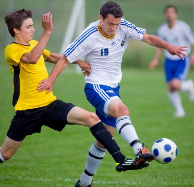 St. Albert Impact Rangers Daniel Abdo (right) defends the ball during action at the Riel soccer fields on July 18.