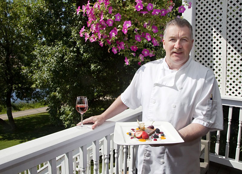 Chef Willie White of the River House Grill presents one of the restaurant&#8217;s most popular dessert dishes