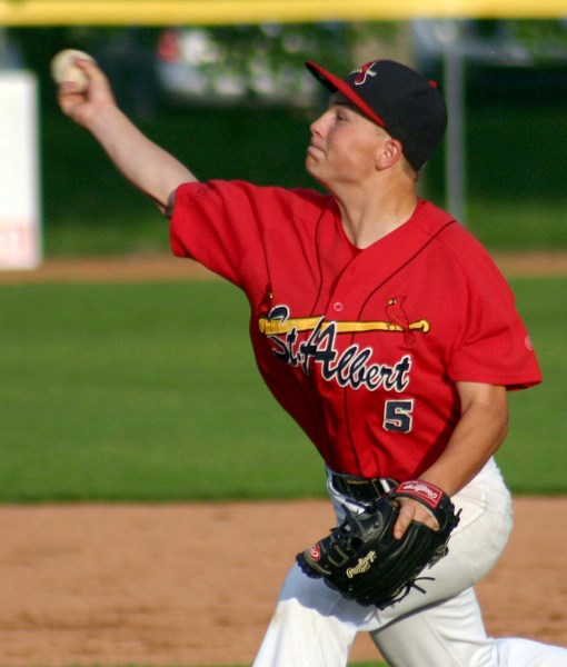 Kory Keohane delivers a pitch for the St. Albert Cardinals during a recent outing in the Norwest Midget AAA Baseball League. The last home game before provincials for the