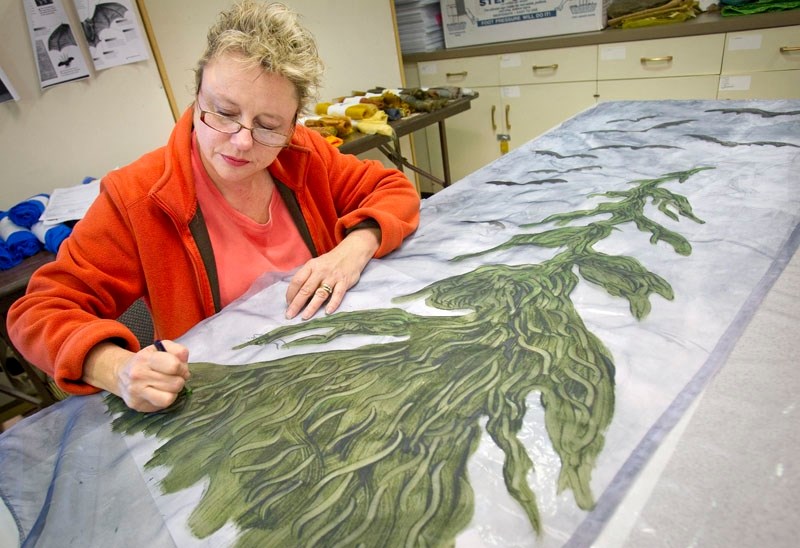 Debbie Tyson works on her contribution to the All Beings Confluence quilting project at the St. Albert Place quilting studio on Wednesday morning.