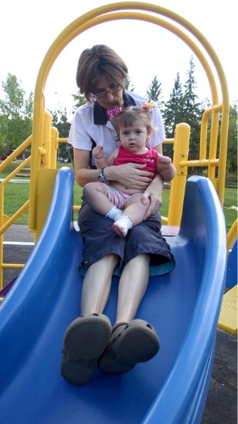 Darolyn Saxton and her 13-month-old daughter
