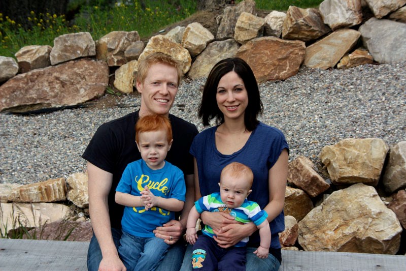 Pat and Tania Woodlock with their son