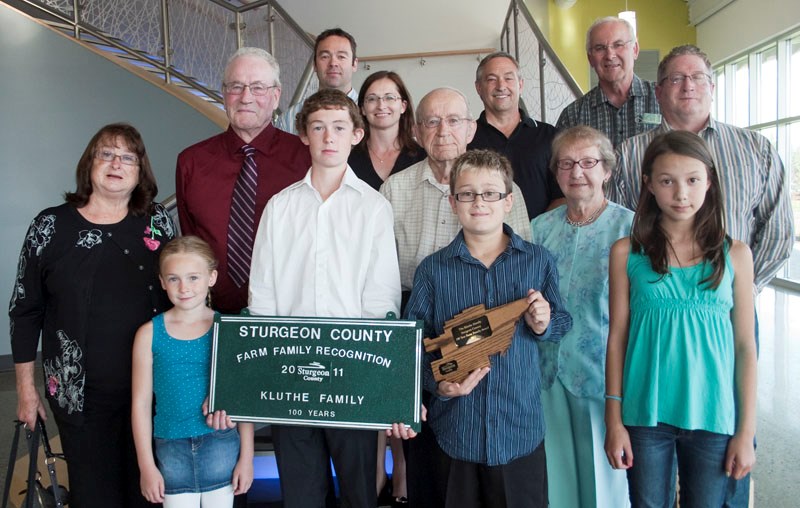 The Kluthe family gets together to celebrate being recognized by Sturgeon County as a 100-year farm family on Thursday at the Morinville Community Cultural Centre.