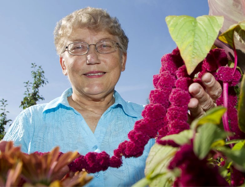 Lucy Krisco of the St. Albert &amp;amp; District Garden Club shows off an amaranthus