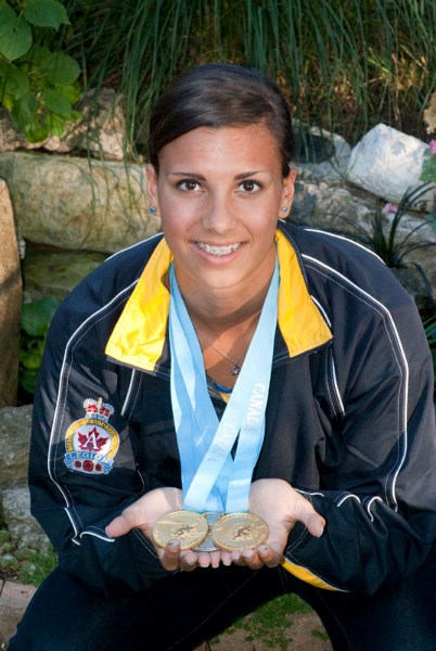 Morgan Walker displays the medals she won at the Canadian Legion Youth Track and Field Championships. In the U16 division