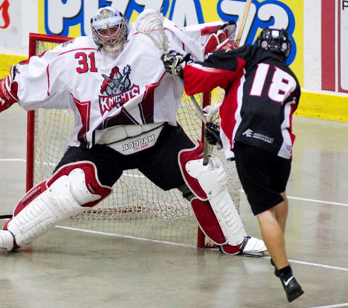 Brad Scott of the St. Albert Miners scored on this move against Calgary Knights&#8217; goalie Alex Coutts during the second period in Sunday&#8217;s deciding game in the