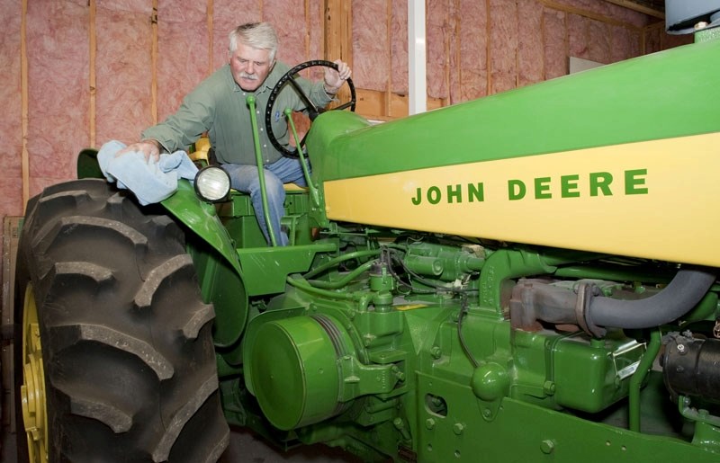Aug 19 2011&amp;lt;br /&amp;gt;Ray Schmidt of the Strathcona Vintage Tractor Association polishes his vintage 1960 John Deere 730 tractor in preparation for an upcoming