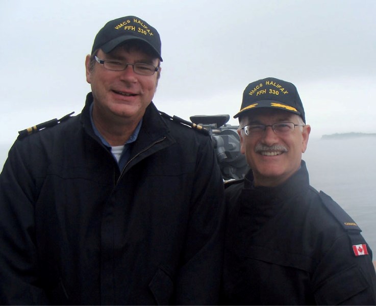 MP Brent Rathgeber and NDP leader Jack Layton aboard the HMCS Halifax in August 2009 as part of a Parliamentary program to experience life on a naval warship.