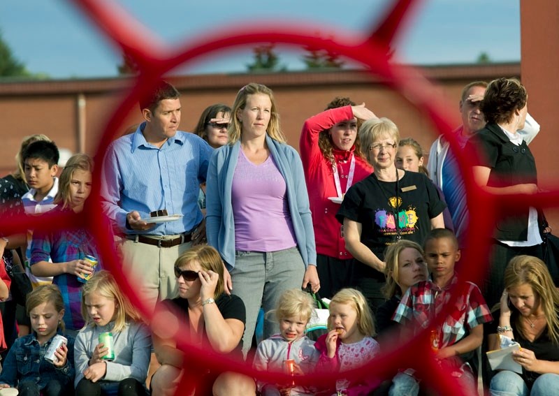 Families gathered for the official opening of the new playground at Vital Grandin Catholic Elementary School last Monday evening on Sunset Boulevard.