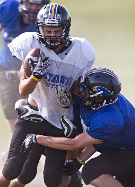 The St. Albert High Skyhawks staged their annual Blue/White intersquad game during last week&#8217;s training camp. Today