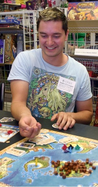 Board game enthusiast Andre Levesque gets ready to roll the dice during a game of Pirate&#8217;s Cove during the Saturday morning session of Gamealot at Mission: Fun and