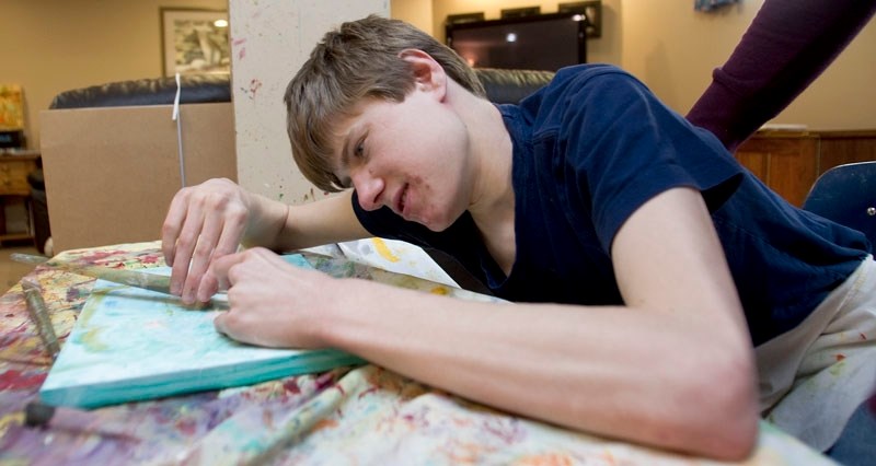Grant Kurtz enjoys painting because it allows him to find ways to express his artistry. With some help
