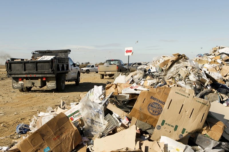 Trucks wait to dump refuse at the Roseridge Landfill near Morinville. St. Albert residents are sending significantly less waste to the dump since the city began separate