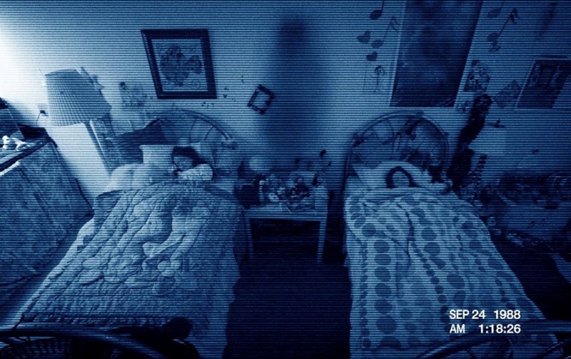 Katie (Chloe Csengery) and Kristi (Jessica Tyler Brown) are tormented by an unknown poltergeist named Toby in Paranormal Activity 3.
