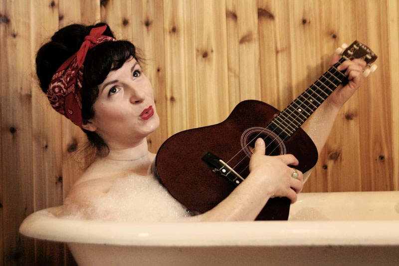 Little Miss Higgins is a pocket-sized powerhouse who plays music brewed up in old-time country blues sprinkled with a little jazz and a hint of folk. She performs at the