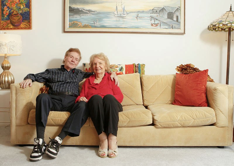 Pat and Louise Ryan relax in their Ironwood Point condominium. The Ryan&#8217;s recently downsized from the Grandin home where they lived for four decades.