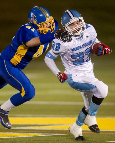 Greg Fleming of the Paul Kane Blues is tracked down from behind in Thursday&#8217;s metro Edmonton premier junior final against the Bev Facey Falcons at Foote Field. The