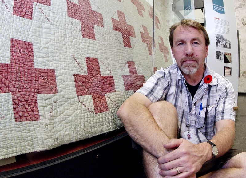 Sean Moir is the curator of the Threads of Comfort exhibition