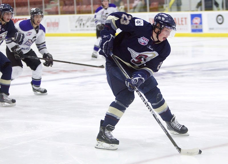 Evan Warmington skates with the puck for the Spruce Grove Saints in Tuesday&#8217;s 6-3 win over the St. Albert Steel at Performance Arena. The St. Albert product has three