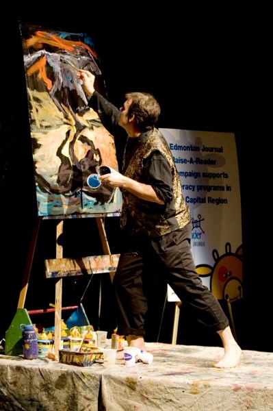 St. Albert artist Lewis Lavoie live paints during a recent event.