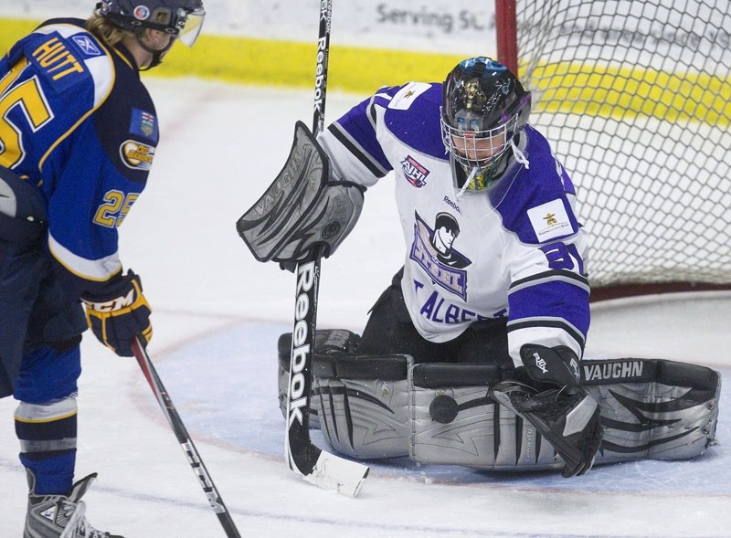 St. Albert Steel netminder Rhys Hadfield stops Killian Hutt on a first period penalty shot in Sunday&#8217;s 3-2 loss to the Fort McMurray Oil Barons at Performance Arena.