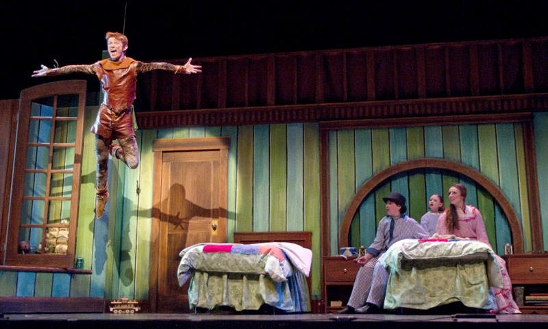 Luc Tellier as Peter Pan entices Wendy (Karina Cox) and her brothers (Max Aisenstat