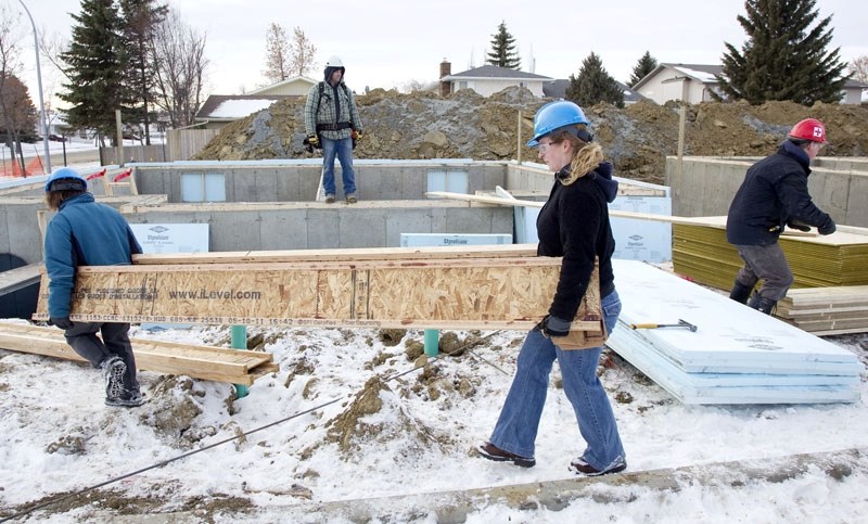Volunteers have begun building the new homes at Habitat for Humanity&#8217;s Aurora Place at 70 Arlington Drive. The organization will spend the next three years building