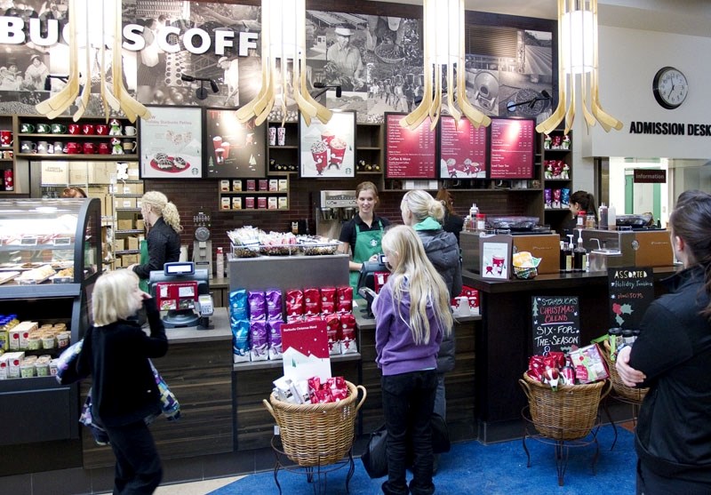 The city-owned Starbucks opened for business at Servus Credit Union Place on Friday. Customers were lined up at the location. Despite the seemingly warm reception by coffee