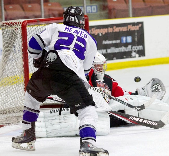 Colten Meaver of the St. Albert Steel scored on this play against Camrose Kodiaks&#8217; netminder Matthew Gibney in the first period of Saturday&#8217;s 4-2 loss at