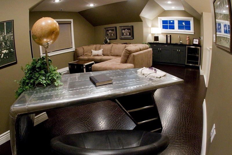 One of the upstairs rooms of this Sarasota showhome features leather flooring and a colour theme of tones of browns.