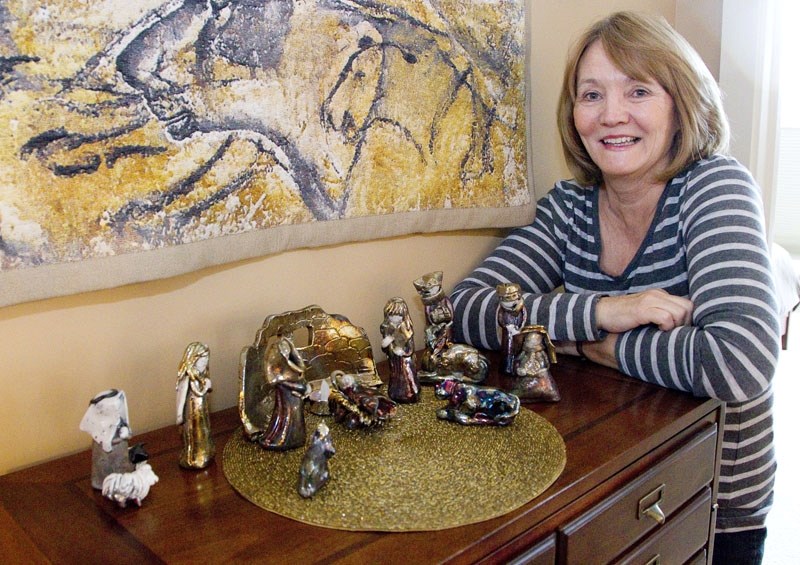 St. Albert artist Margaret Belec shows off her finished Christmas creche at her home. She makes the scene each December.