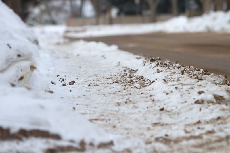 ROUGH TERRAIN – This snow-covered and slippery sidewalk sits close to where a St. Albert woman in a motorized scooter was struck and killed this week. Using these sidewalks