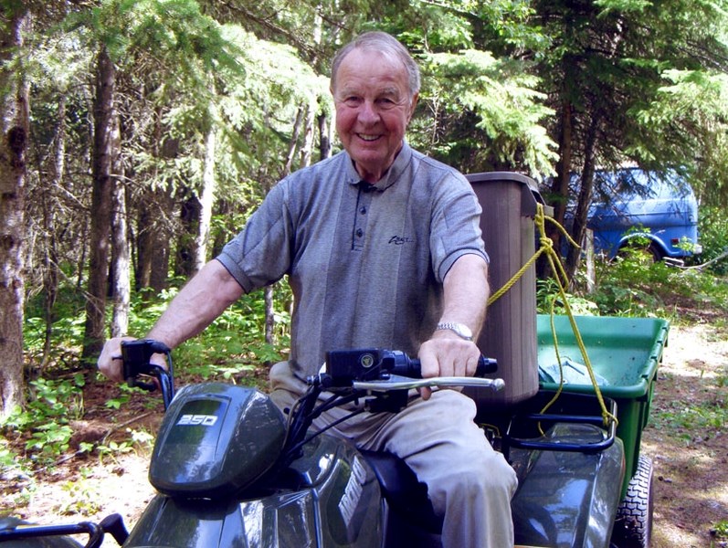 CHEERFUL BUILDER – Jock Fyfe loved to build. Here he&#8217;s pictured at Lower Mann Lake near St. Paul