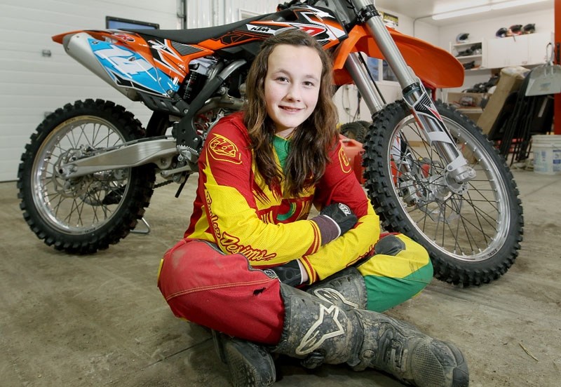 FULL THROTTLE – Sturgeon County resident Ireland Perrott is a competitive motocross racer. The 13-year-old is seen here with her 250 KTM SXF bike.