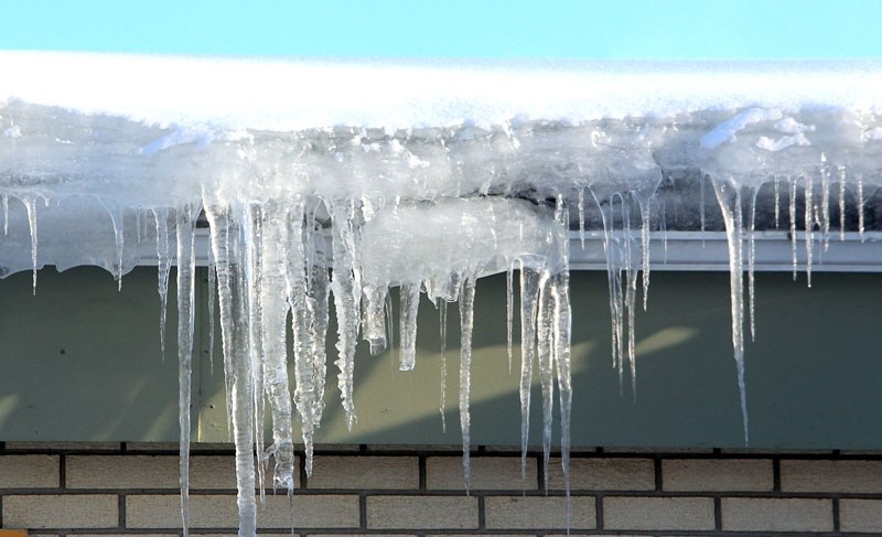 BEWARE OF ICE – Icicles are pretty to look at