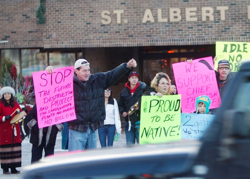 IDLE NO MORE — Native and non-native members of the public alike gathered in front of St. Albert Place on Sunday afternoon to rally in support of the grassroots movement Idle 