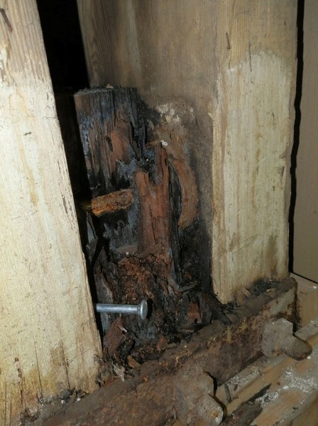 ROTTEN WOOD – An example of a rotted support column in the roof of the Morinville Arena. Engineers have pushed a bolt into it to measure the depth of the decay.