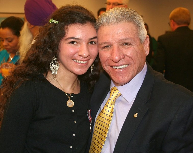 Balbina Fernandez de la Cruz celebrates her new Queen Elizabeth II Diamond Jubilee medal with her dad
