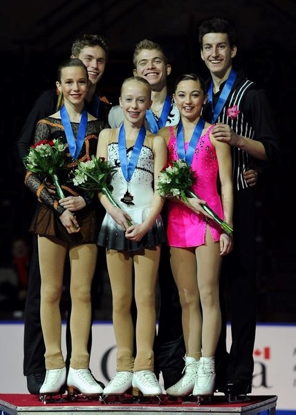 PODIUM FINISH &#8211; (Right) Chris Mostert of St. Albert and Taylor LeClaire of Tofield were bronze medallists in novice pairs at the Canadian figure skating championships