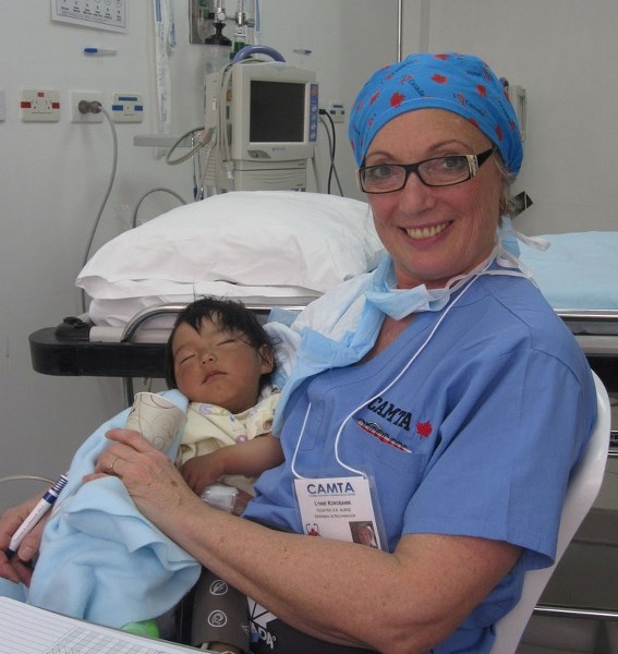 HELPING HANDS – Recovery room nurse Lynne Korobanik does volunteer work with the Canadian Association of Medical Teams Abroad. The group sends dozens of medical professionals 