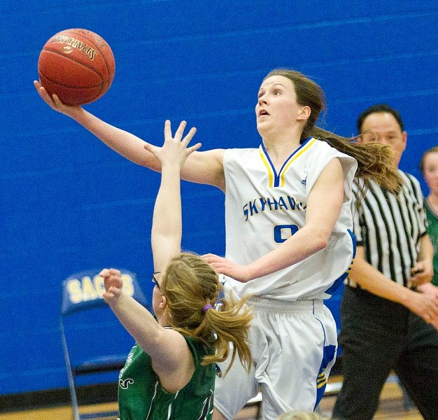 SOARING TO VICTORY &#8211; St. Albert Skyhawks co-captain Kayla Ivicak goes for a layup against the St. Joseph Ceinahs of Grande Prairie in the first half in Thursday&#8217;s 