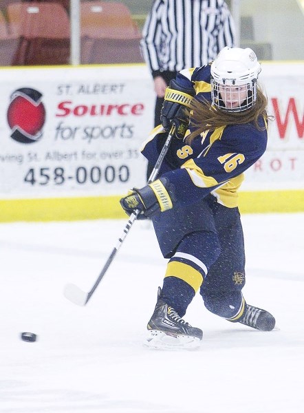 SLAP SHOT &#8211; St. Albert Slash defenceman Jessica Dyck fires the puck in Sunday&#8217;s 2-1 win against the visiting Southeast Tigers (20-5-6) of Medicine Hat in the
