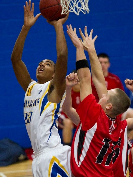 REACH FOR THE TOP &#8211; Isaiah Jackson goes to the hoop for the St. Albert Skyhawks against the Leduc Tigers in Saturday&#8217;s semifinal at the Skyhawks Invitational