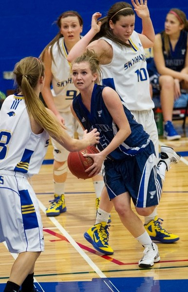 ATTACKING &#8211; Josee Larson of the Paul Kane Blues penetrates the St. Albert Skyhawks&#8217; defence Wednesday at the SkyDome. Larson was Paul Kane&#8217;s top scorer with 