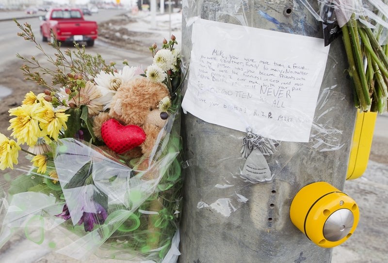 IN MEMORY – A makeshift memorial has been set up for the driver of a car who died in a collision Saturday evening at the intersection of St. Albert Trail and Hebert Road.