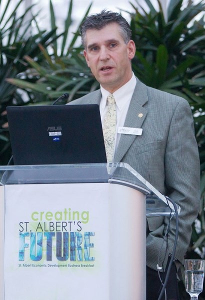 ADDRESSING THE FUTURE – Economic development director Guy Boston addresses the morning crowd at the St. Albert Economic Development Business Breakfast at the Enjoy Centre on