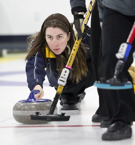 SKIP ROCKS &#8211; Christina Monk aims for the broom in the St. Albert Centre Ladies Bonspiel final Sunday. Monk